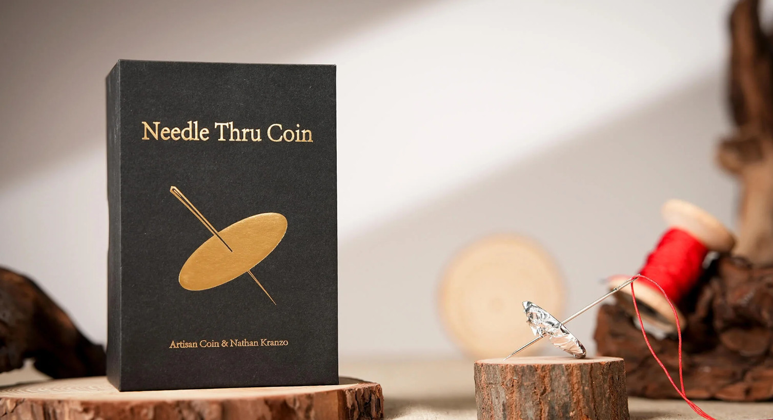 Needle Thru Coin by Artisan Coin & Nathan Kranzo